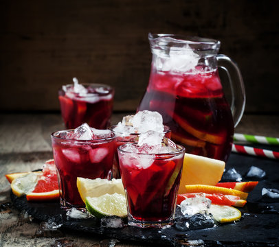 Spanish sangria with fruit and ice, selective focus