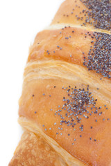 Fresh and tasty croissant over white background