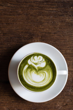 matcha green tea latte with rose pattern latte art