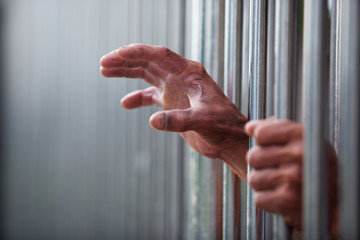 hand in jail