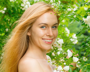 Portrait of a smiling girl on nature