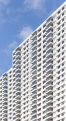 Fototapeta premium Close - up High rise modern building pattern and background