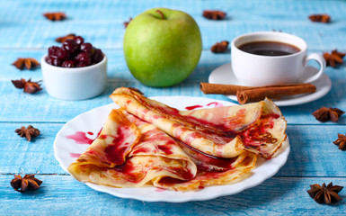 Breakfast pancakes with cherry jam