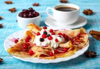 Breakfast pancakes with cherry jam