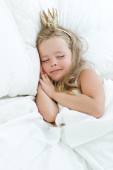 Obraz na płótnie Canvas Little princess in the morning bed