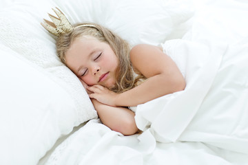 Obraz na płótnie Canvas Little princess in the morning bed