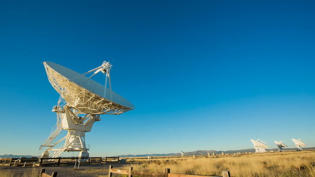 Satellite Left and Panning Right. Two shots of a satellite from the Ver Large Array in New Mexico left justified. Second shot camera pans right.
