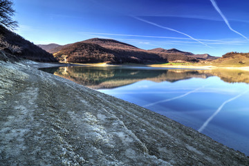 Beautiful landscape with lake and blue sky