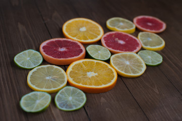 Fototapeta na wymiar Citrus fruit - grapefruit, orange, lemon, lime.