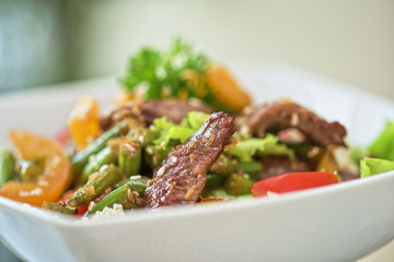 Warm salad with veal
