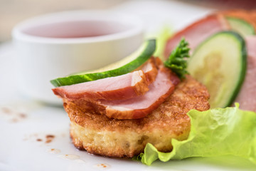 Cheese pancakes with ham