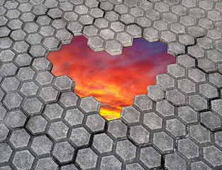 Сongratulations on Valentine's Day. Heart of stones.	
Hole on the road, in the form of heart with...