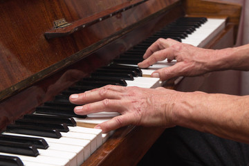Obraz premium Hands pianist playing classical piano. Music
