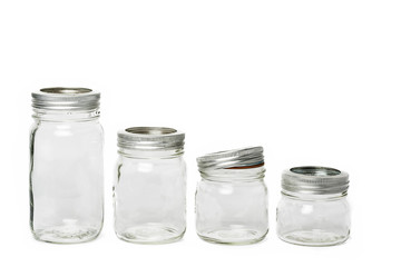 Four empty glass jar