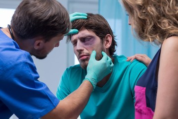 Beaten man with black eye