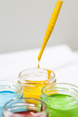 Colorful paints in jars