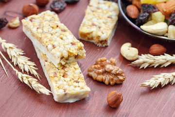 Cereal bars of granola with nuts and raisins