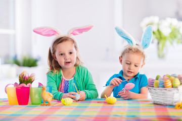 Kids with colorful Easter eggs