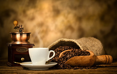 Espresso coffee with old coffee grinder - obrazy, fototapety, plakaty