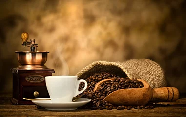 Rolgordijnen Espresso coffee with old coffee grinder © Antonio Gravante