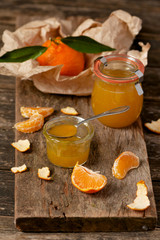 Mandarin vanilla homemade marmalade in jars. Selective focus.
