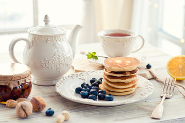 Fototapeta na wymiar Morning breakfast with pancakes