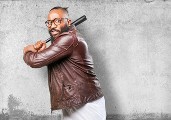 black man with a bat on white