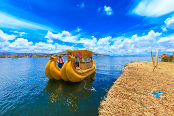 Totora boat on the Titicaca lake near Puno, Peru - obrazy, fototapety, plakaty