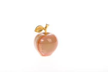 Souvenir apple from onyx with gold leaf