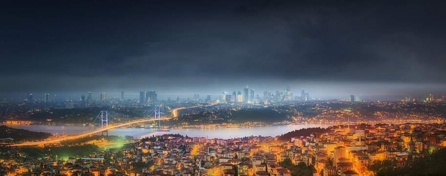 Panorama of Istanbul and Bosphorus bridge at night