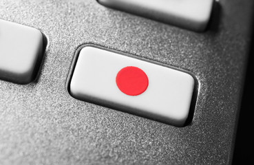 Macro Of A Record Button On Chrome Remote Control For A Hifi Stereo Audio System