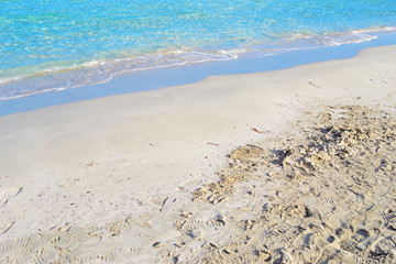 turquoise water and white sand in Sardinia