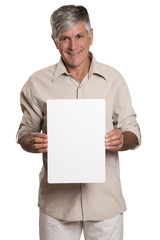 Portrait of a mature man holding a blank panel.