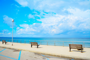benches by the sea in Sardinia