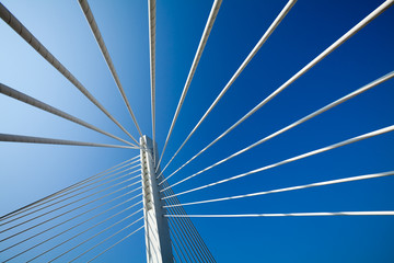 Wonderful white bridge structure over clear blue sky