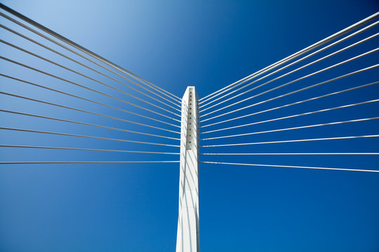 Wonderful white bridge structure over clear blue sky