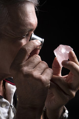 Fototapeta premium portrait of a jeweler during the evaluation of jewels.