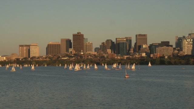 Shot of Boston from across the Charles River at sunset.