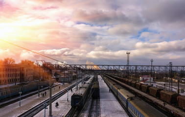 Fototapeta na wymiar railway Station with trains at sunset. top view