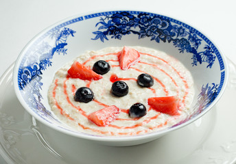 oat porridge with fresh berries. 