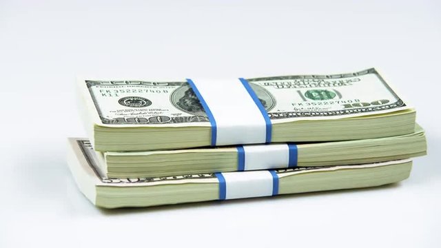 Clip of American currency being tossed down.