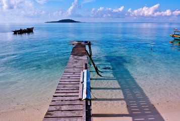 Pier at tropical beach. Maiga Island, Sabah Borneo, Malaysia.