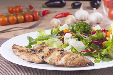 Chicken filet and salad