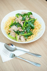 Crispy fried noodle with pork soaked in gravy