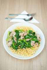 Crispy fried noodle with pork soaked in gravy