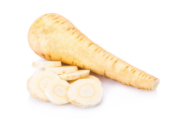 Fresh parsnip roots on a white background