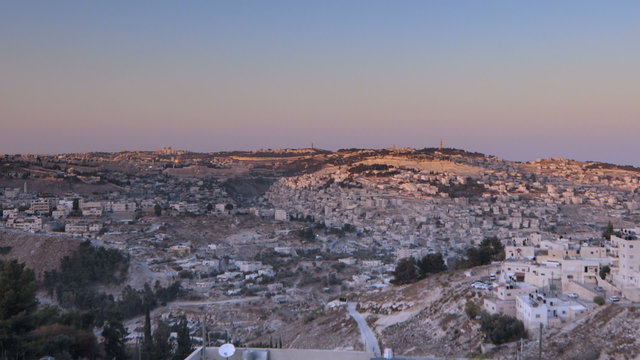 Panning shot of Time-lapse of people touring the Edicule of the Holy Sepulchre.