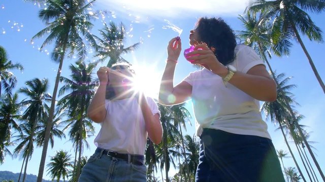 Happy Lifestyle of Two Young Fashion Girls Outdoors.