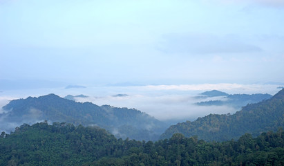 misty mountain hills landscape, layers of mountains with fog