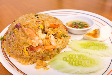 Tom yum fried rice with tiger prawn.